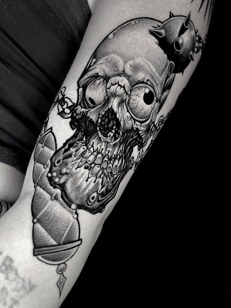 Black and grey melting skull ice cream cone tattoo